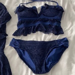 Swim suit with matching cover up. All size small.